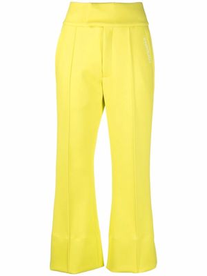 Khrisjoy logo-print cropped flared trousers - Yellow