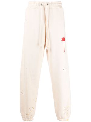 Palm Angels PXP PAINTED SWEATPANTS OFF WHITE RED - Neutrals