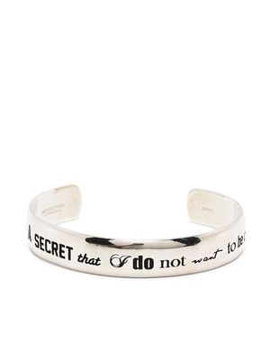 UNDERCOVER slogan engraved cuff - Silver