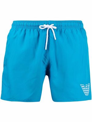 Emporio Armani logo-embroidered swimming trunks - Blue