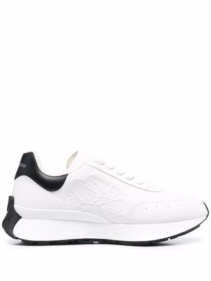 Alexander McQueen embossed logo exaggerated-sole sneakers - White