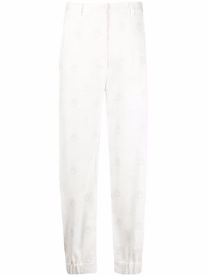 DEPENDANCE peacock print trousers - White