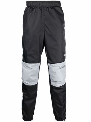 The North Face logo-patch colour-block track pants - Black