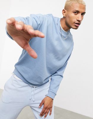 ASOS DESIGN oversized sweatshirt in blue