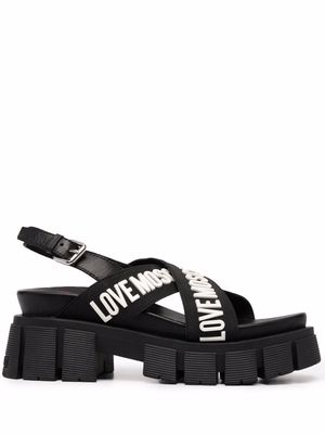 Love Moschino crossover logo strap sandals - Black