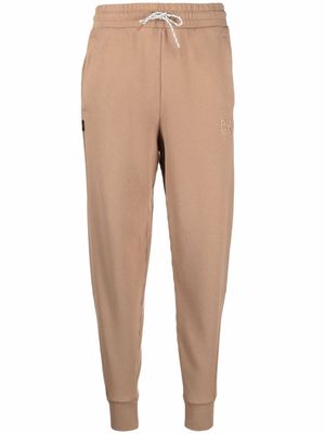 PUMA logo-embroidered track pants - Brown