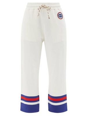 Gucci - GG-embroidered Cropped Cotton-jersey Track Pants - Womens - White Multi