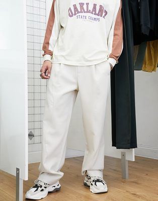 Bershka wide fit tailored pants in beige-Neutral