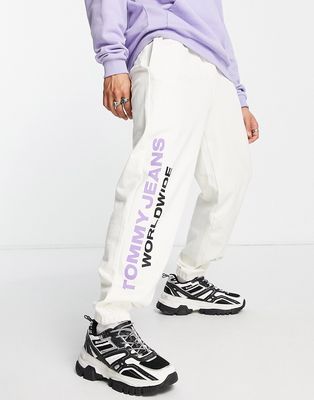 Tommy Jeans global unites logo cuffed sweatpants in off white