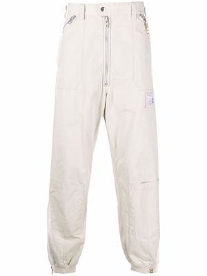 Maison Mihara Yasuhiro zip-detail straight leg trousers - Neutrals
