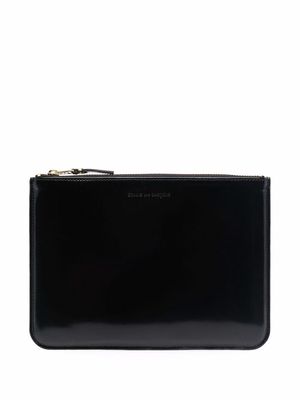 Comme Des Garçons Wallet embossed-logo clutch bag - Black