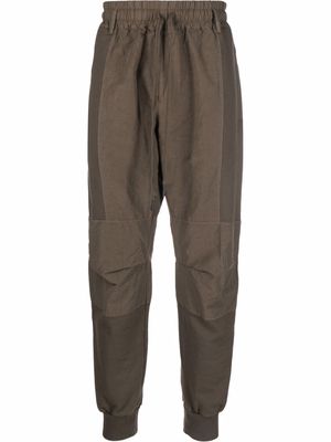 Andrea Ya'aqov panelled-design trousers - Brown