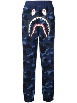 A BATHING APE® shark-teeth print track trousers - Blue