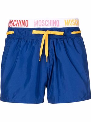 Moschino logo-waistband swim shorts - Blue