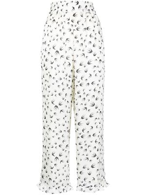 Sueundercover swallow-print wide leg trousers - White
