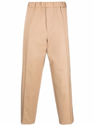 Jil Sander pressed-crease elasticated-waist straight trousers - Brown