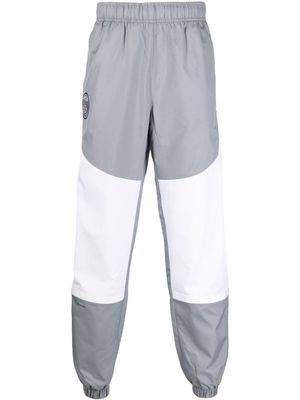 Nike patch-detail panelled track pants - Grey