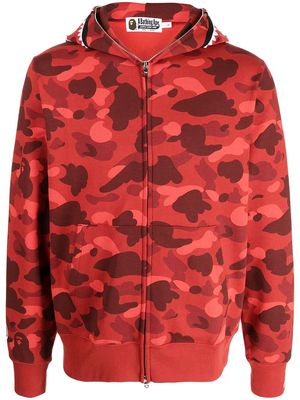 A BATHING APE® camouflage-print zipped hoodie - Red