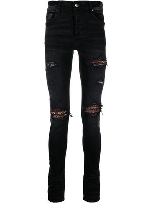 AMIRI skinny ripped jeans - Black