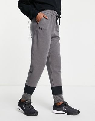 Under Armour Rival Terry sweatpants in gray