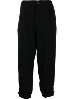Nanushka rolled-cuff combed cotton trousers - Black