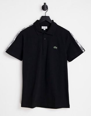 Lacoste polo shirt with sleeve taping in black