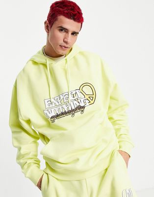 ASOS DESIGN oversized hoodie in yellow with text print - part of a set-Multi