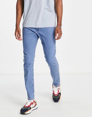 Wrangler Bryson skinny jeans in mid blue