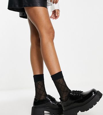 Truffle Collection wide fit chunky lace up shoes with exaggerated sole in black