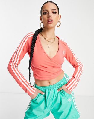 adidas Originals 3 stripe v-neck long sleeve cropped top in pink-Orange