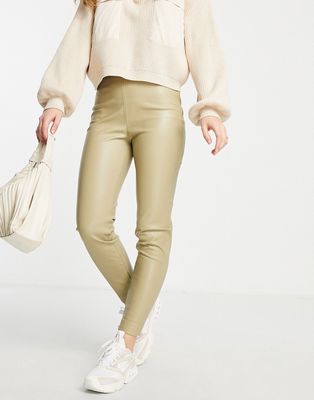 Mango faux leather pants with side slit in light green
