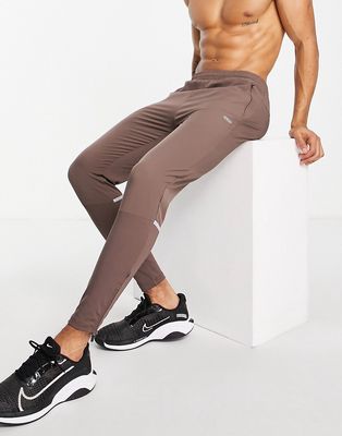 ASOS 4505 hybrid training joggers with woven panels-Brown