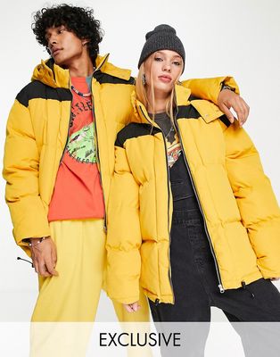 Reclaimed Vintage Inspired unisex puffer jacket in yellow and black