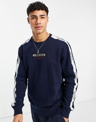 Hollister sweatshirt in navy with sleeve logo taping