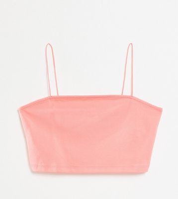 ASOS DESIGN Petite ultimate crop bandeau with skinny straps in coral-Pink