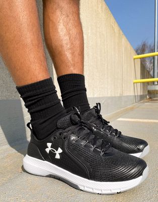 Under Armour Training Charged Commit 3 sneakers in black and white