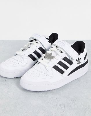 adidas Originals Forum low sneakers in white with black stripes