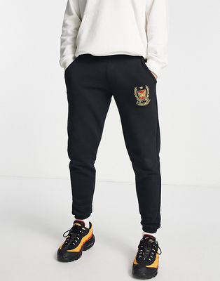 Good For Nothing sweatpants in black with crest print