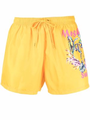 Moschino graphic-print swim shorts - Yellow