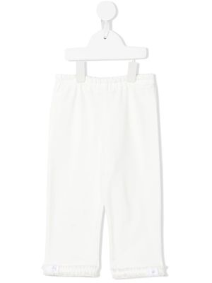 Familiar ruffle-hem trousers - White