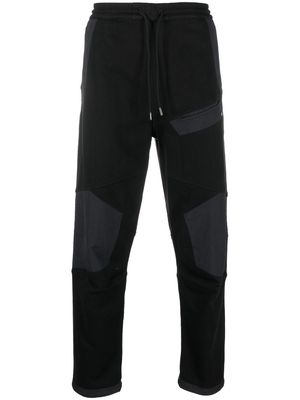 Maharishi Maha Tech panelled track trousers - Black