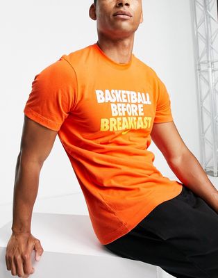 Nike Basketball Dri-FIT slogan T-shirt in orange