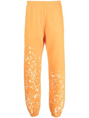 Liberal Youth Ministry bleached-effect track pants - Orange