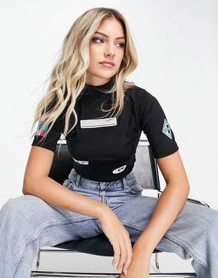 The Couture Club high neck crop top with badge detail in black - part of a set