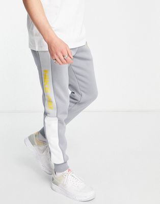 Nike Air paneled cuffed fleece sweatpants in gray