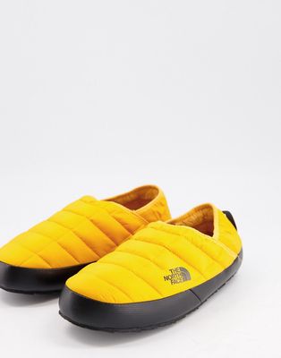 The North Face Thermoball Traction V mule slippers in yellow