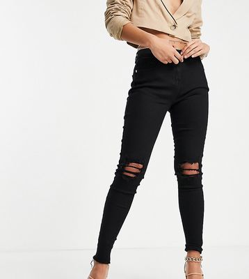 Parisian Petite skinny jeans with ripped knee in black