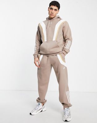 adidas Training Earth Shades fleece pants in brown