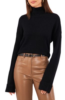 1.STATE Sleeveless Pointelle Sweater in Rich Black