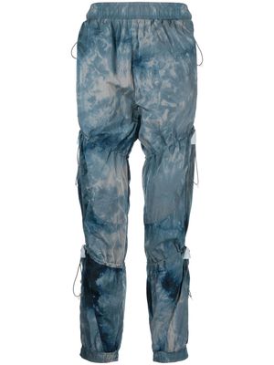 A.A. Spectrum crinkled-finish track trousers - Blue